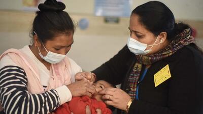 A health worker administers a dose of polio vaccine to a child at a polyclinic in Gurugram’s Sector 31 on Sunday. (Parveen Kumar/HT photo) A health worker administers a dose of polio vaccine to a child at a polyclinic in Gurugram’s Sector 31 on Sunday. (Parveen Kumar/HT photo)