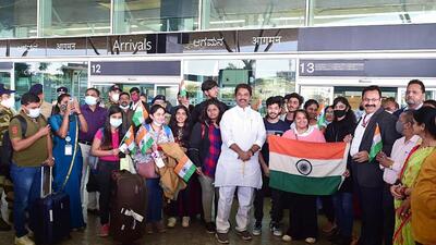 Karnataka revenue minister R. Ashoka welcomes students after being evacuated from Ukraine due to the Ukraine-Russia war, at Kempegowda International Airport, in Bengaluru on February 27. (ANI)