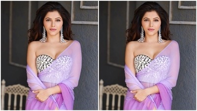 The photos show the star posing in a sheer saree that comes in dual lavender tones. Rubina draped the see-through six yards, embroidered with silver gota patti on the pallu, in traditional style around her body. (Instagram/@rubinadilaik) The photos show the star posing in a sheer saree that comes in dual lavender tones. Rubina draped the see-through six yards, embroidered with silver gota patti on the pallu, in traditional style around her body. (Instagram/@rubinadilaik)