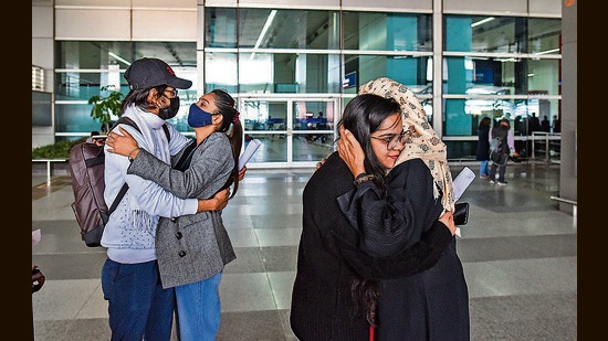 Stranded Indian students in Ukraine, reunited with their family upon arrival at Indira Gandhi International Airport, in New Delhi, India, on Tuesday. (Hindustan Times)