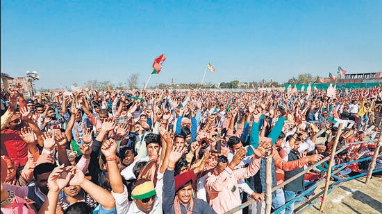 BJP supporters at a rally in Kushinagar, amid the ongoing UP elections, on Monday. (ANI)