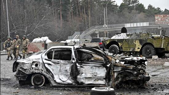 A view of the car which was destroyed by recent shelling on a check-point in the city of Brovary outside Kyiv on Tuesday. (AFP)