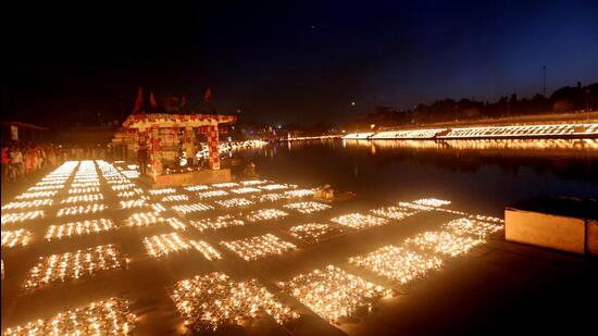 Earthen lamps lit up at the banks of the Kshipra river as part of the ‘Shiv Jyoti Arpanam Mahotsava’ on the occasion of Maha Shivaratri', in Ujjain on Tuesday. Ujjain created a Guinness record by lighting 11.71 lakh clay lamps. (ANI)
