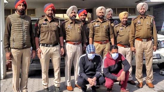 The vehicle-lifting accused in the custody of PAU police in Ludhiana on Tuesday. (HT Photo)