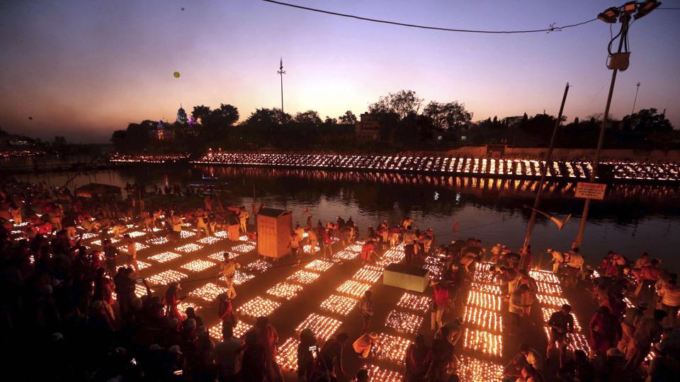 Devotees light lamps on the banks of the Kshipra river at an event titled ‘Shiv Jyoti Arpanam’, on the occasion of ‘Mahashivratri’, in Ujjain, Tuesday, March 01, 2022. (PTI) Devotees light lamps on the banks of the Kshipra river at an event titled ‘Shiv Jyoti Arpanam’, on the occasion of ‘Mahashivratri’, in Ujjain, Tuesday, March 01, 2022. (PTI)