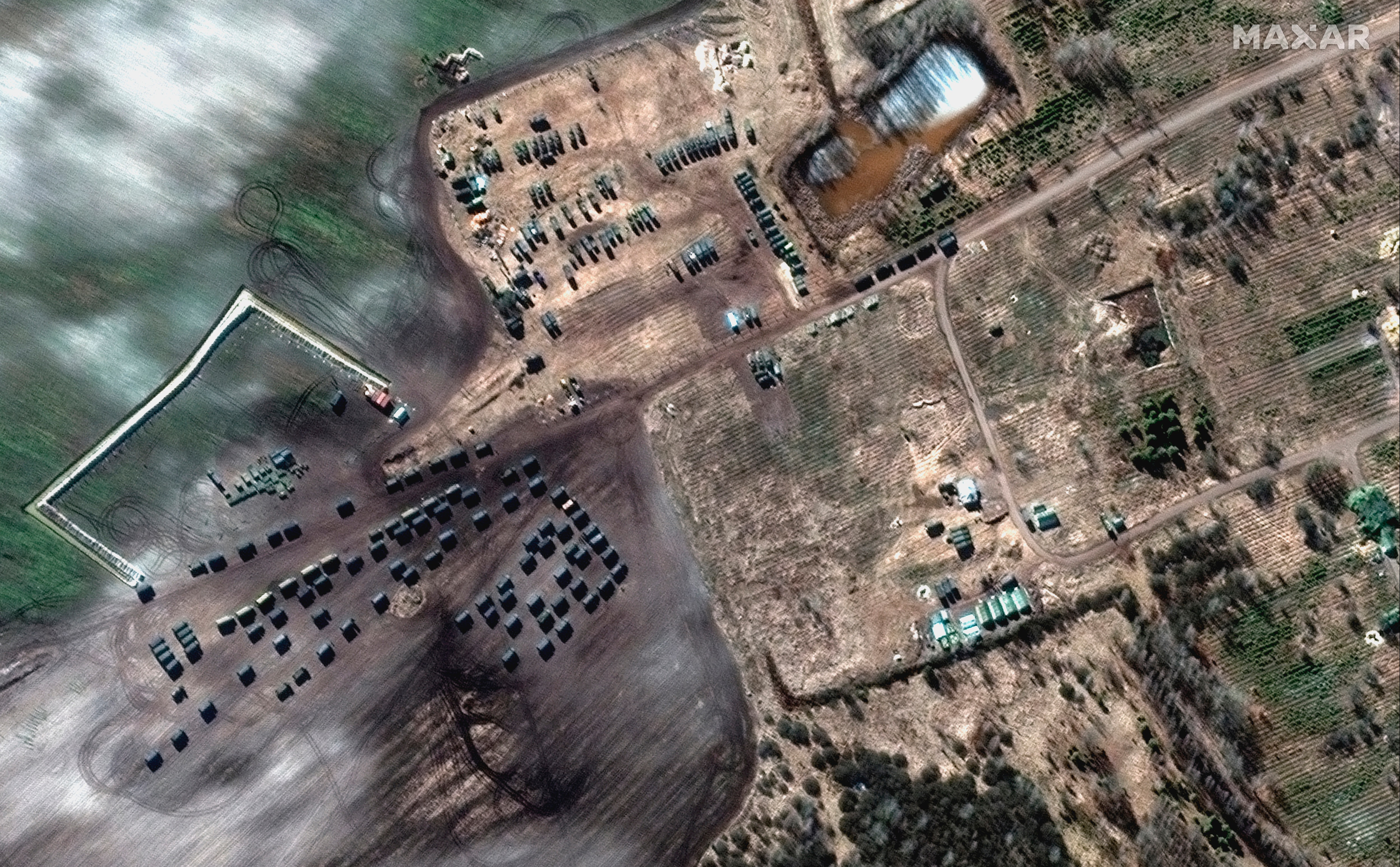 This satellite image provided by Maxar Technologies shows ground forces equipment and convoy in Khilchikha, Belarus. (AP)
