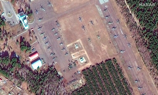 This satellite image provided by Maxar Technologies shows closer view of ground attack helicopters on VD Bokov airfield near Mazyr, Belarus. (AP)