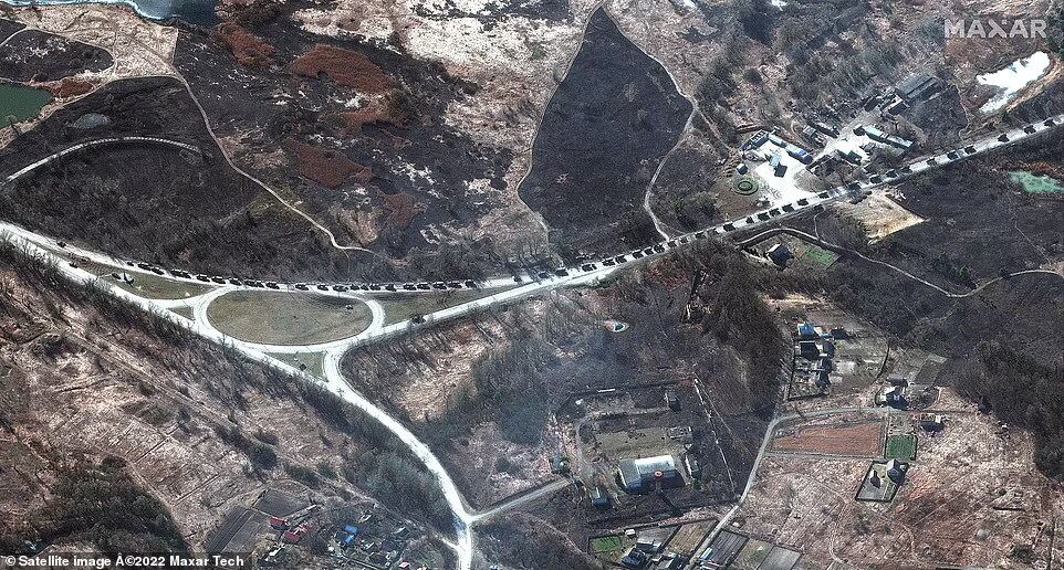 A massive Russian military convoy is seen advancing from Belarus in the north towards Kyiv. This Maxar satellite image taken and released on Monday shows part of a military convoy in southern Ivankiv. (Maxar Technologies)