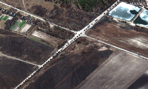 This satellite image provided by Maxar Technologies shows military convoy northwest of Invankiv, Ukraine. (AP)
