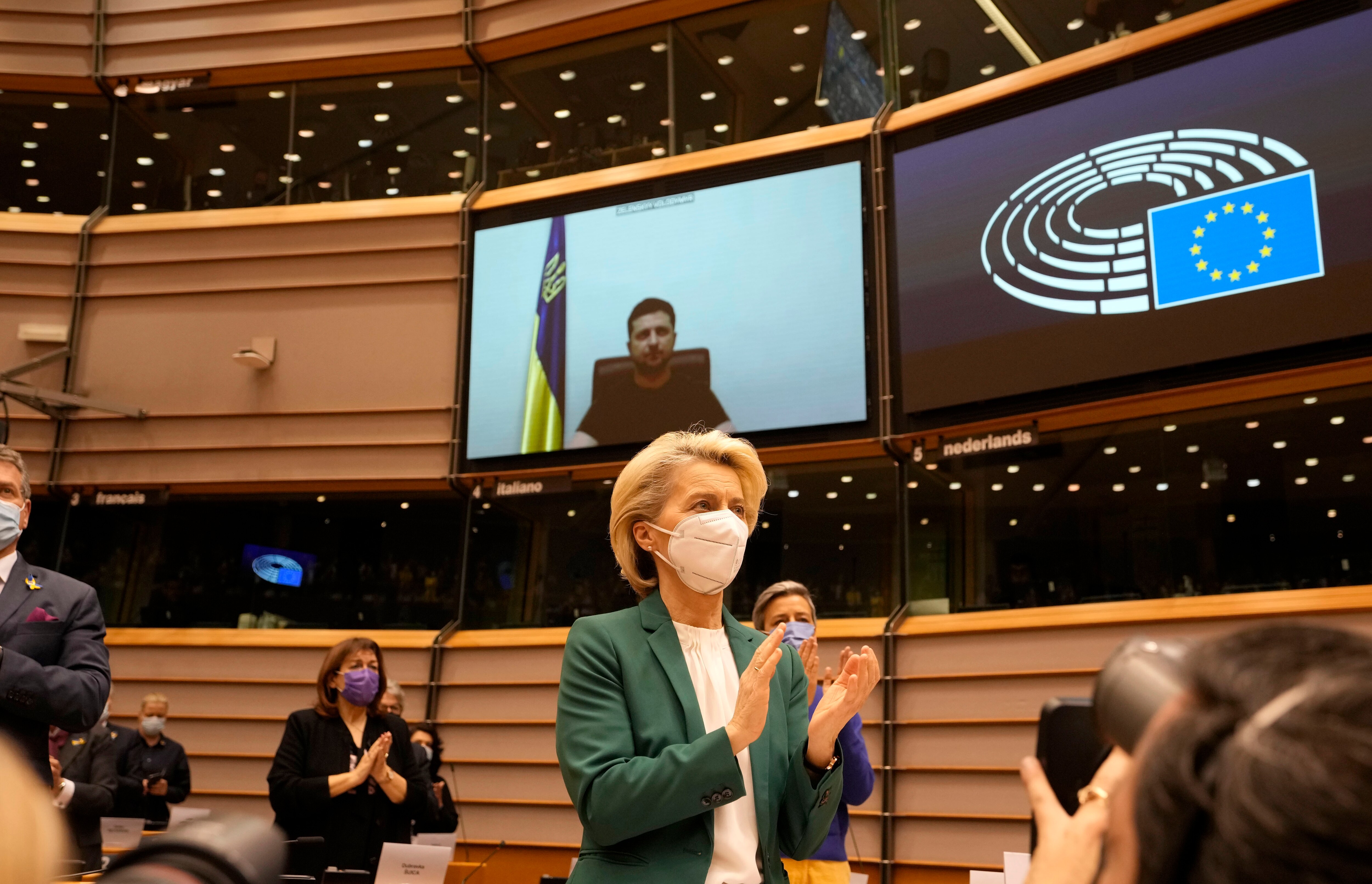 European Commission president Ursula von der Leyen applauds after an address by Ukraine's President Volodymyr Zelenskyy, via video link, during an extraordinary session on Ukraine at the European Parliament in Brussels, Tuesday, March 1, 2022. (AP Photo/Virginia Mayo) European Commission president Ursula von der Leyen applauds after an address by Ukraine's President Volodymyr Zelenskyy, via video link, during an extraordinary session on Ukraine at the European Parliament in Brussels, Tuesday, March 1, 2022. (AP Photo/Virginia Mayo)