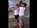 Screengrab from the Instagram video that shows the brother tying his little sister’s hair at school. (instagram/@goodnews_movement) Screengrab from the Instagram video that shows the brother tying his little sister’s hair at school. (instagram/@goodnews_movement)