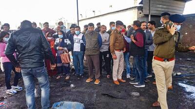 Police personnel with locals at the site after an explosion in a firecracker factory, in Una district, on February 22, 2022. (PTI file) Police personnel with locals at the site after an explosion in a firecracker factory, in Una district, on February 22, 2022. (PTI file)