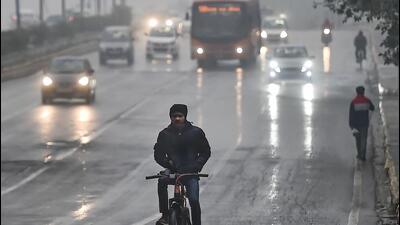 A rainy morning in Delhi late last month. (PTI Photo) A rainy morning in Delhi late last month. (PTI Photo)