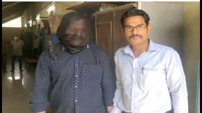 Kalyan GRP arrest (face covered) man 3 years after complaint lodged for sexual assault. (HT PHOTO) Kalyan GRP arrest (face covered) man 3 years after complaint lodged for sexual assault. (HT PHOTO)