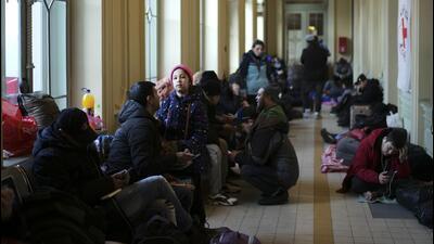 Refugees wait at the train station in Przemysl, Poland, after fleeing from Ukraine. (AP) Refugees wait at the train station in Przemysl, Poland, after fleeing from Ukraine. (AP)