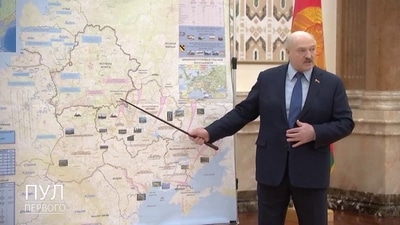 The purported image of Belarus President Alexandar Lukashenko pointing towards a map.