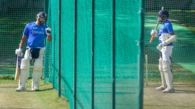 India's captain Rohit Sharma talks with a teammate during net practice ahead of 1st Test against Sri Lanka at IS Bindra PCA Stadium in Mohali. (PTI) India's captain Rohit Sharma talks with a teammate during net practice ahead of 1st Test against Sri Lanka at IS Bindra PCA Stadium in Mohali. (PTI)