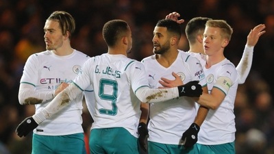 Manchester City's Riyad Mahrez celebrates scoring their first goal with teammates. (REUTERS)