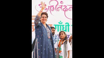 AICC General Secretary Priyanka Gandhi waves towards supporters during a public meeting in Azamgarh for the ongoing UP Assembly polls. (PTI)