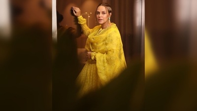 Neha Dhupia picked this gorgeous yellow salwar suit from designer Archana Jaju's luxury collection. (Instagram/@nehadhupia)