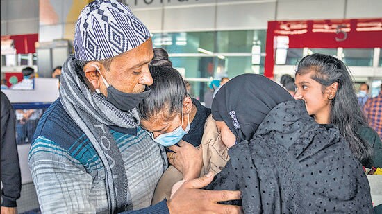A girl hugs her parents after arriving at Delhi’s IGI airport, from war-hit Ukrane, on Wednesday (AP)