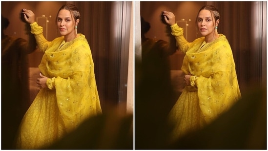 Neha Dhupia is currently basking on the success of her recent release A Thursday. Neha's fashion game has been strong since day 1. The actor is a mother of two now and still manages to ace any outfit she dons. Her Instagram handle is a lookbook for all things stylish. In her recent pictures, the Singh is King actor looked breathtaking in a yellow embroidered salwar suit.(Instagram/@nehadhupia)