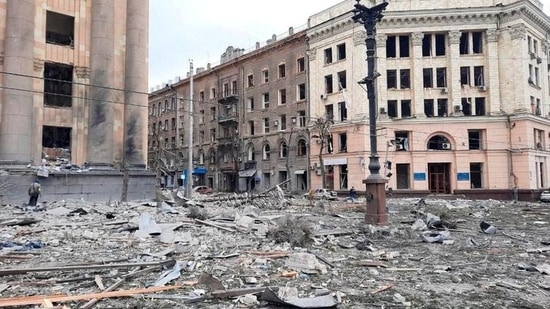 Rescuers remove debris in the regional administration building, which city officials said was hit by a missile attack, in central Kharkiv, Ukraine, Tuesday.(REUTERS)