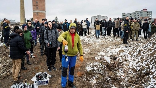 Civilians train to throw Molotov cocktails to defend the city, in Zhytomyr, Ukraine, Tuesday.(REUTERS)