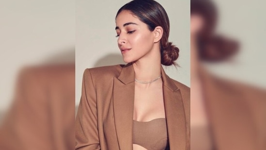Ananya Panday opted for soft glam makeup and tied her hair in a low bun.(Instagram/@tanyaghavri)