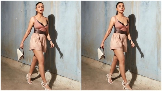 Mrunal aptly accessorised her look for the day with a triangular sling bag from the shelves of Adisee and white stilettos from the house of Public Desire.(Instagram/@mrunalthakur)
