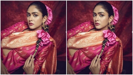 In a ponytail decorated with golden threads and a pink accessory adorning her head, Mrunal looked right out of an ethnic fashion fairytale.(Instagram/@mrunalthakur)