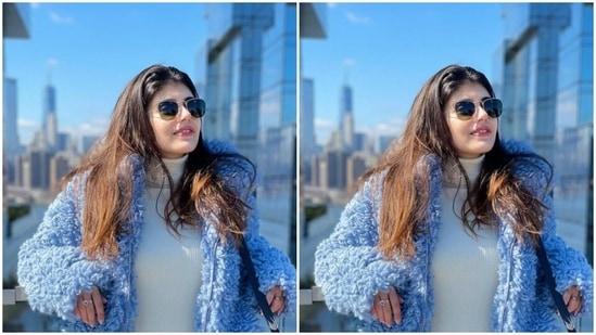 For the fine chilly winter morning of New York, Sanjana paired a white turtleneck sweater with a pair of blue denims. She added more layers to her look with a soft blue fur jacket.(Instagram/@sanjanasanghi96)