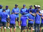 India's head coach Rahul Dravid speaks to the team members during a practice session ahead of the 1st Test between India and Sri Lanka at IS Bindra PCA Stadium, in Mohali.