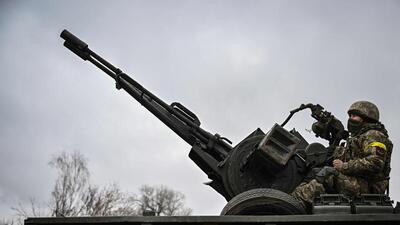 A Ukrainian soldier keeps position sitting on a ZU-23-2 anti-aircraft gun at a frontline, northeast of Kyiv on Thursday. (AFP) A Ukrainian soldier keeps position sitting on a ZU-23-2 anti-aircraft gun at a frontline, northeast of Kyiv on Thursday. (AFP)