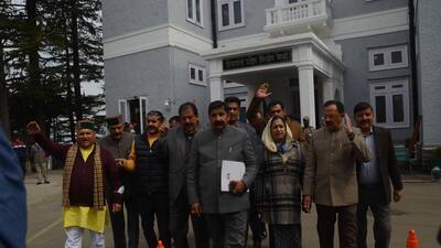 Leader of Opposition Mukesh Agnihotri with Congress legislators stage a walkout from the Himachal assembly over old pension scheme in Shimla on Thursday. (Deepak Sansta/HT)