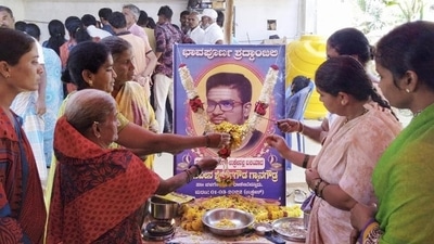 Locals pay floral tribute to Naveen Shekharappa, a final year medical student, who was killed in Russian shelling in the Ukrainian city of Kharkiv, at Chalageri village, in Haveri on Wednesday. (PTI) Locals pay floral tribute to Naveen Shekharappa, a final year medical student, who was killed in Russian shelling in the Ukrainian city of Kharkiv, at Chalageri village, in Haveri on Wednesday. (PTI)