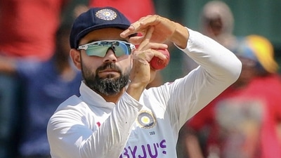 Virat Kohli signals for DRS during a Test against New Zealand in December 2021. (PTI) Virat Kohli signals for DRS during a Test against New Zealand in December 2021. (PTI)