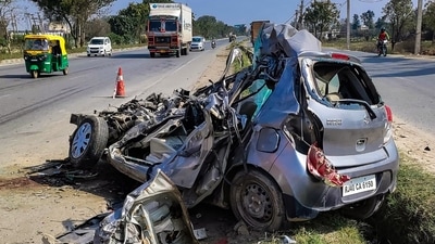 The mangled remains of the car along the Delhi-Jaipur Expressway (PTI) The mangled remains of the car along the Delhi-Jaipur Expressway (PTI)