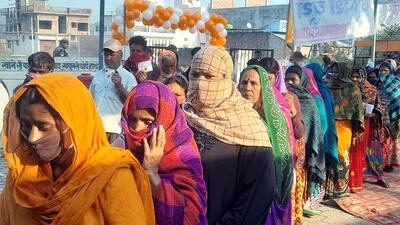 Balrampur, Mar 03 (ANI): Voters wait in queues to cast their votes for the Sixth phase of Uttar Pradesh Assembly elections, at a polling booth, in the Balrampur district on Thursday. (ANI Photo) (ANI) Balrampur, Mar 03 (ANI): Voters wait in queues to cast their votes for the Sixth phase of Uttar Pradesh Assembly elections, at a polling booth, in the Balrampur district on Thursday. (ANI Photo) (ANI)
