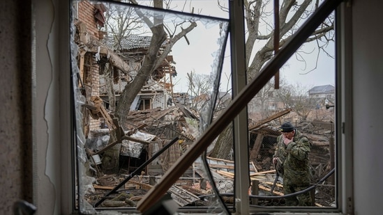 Gorenka: Andrey Goncharuk, 68, a member of territorial defense wipes his face in the backyard of a house that was damaged by a Russian airstrike. AP/PTI(AP03_03_2022_000006A) (AP)