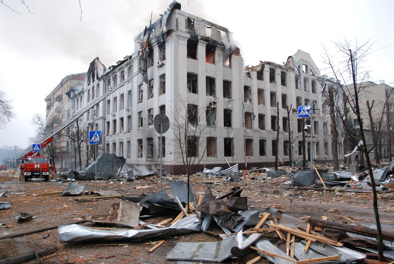 Firefighters work to extinguish a fire at the Kharkiv National University building, which city officials said was damaged by recent shelling, in Kharkiv, Ukraine March 2, 2022. (REUTERS/Oleksandr Lapshyn)