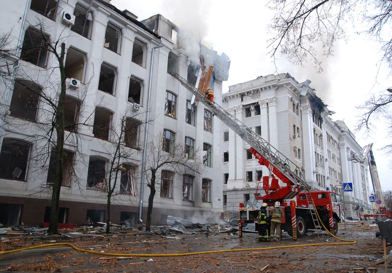Firefighters work to extinguish a fire at the Kharkiv National University building, which city officials said was damaged by recent shelling, in Kharkiv, Ukraine March 2, 2022. (REUTERS/Oleksandr Lapshyn)