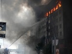 Firefighters hose down a burning building after bombing in Kyiv, Ukraine, Thursday,(AP) Firefighters hose down a burning building after bombing in Kyiv, Ukraine, Thursday,(AP)