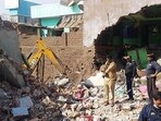 Bhagalpur, Mar 04 (ANI): Police personnel inspect the site after a massive explosion ripped through a three-storey building near the Kajwali Chak area under Tatarpur Police station on Thursday night, in Bhagalpur on Friday. (ANI Photo) (Aftab Alam Siddiqui)