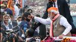 Prime Minister Narendra Modi at a road show in Varanasi on Friday (ANI)