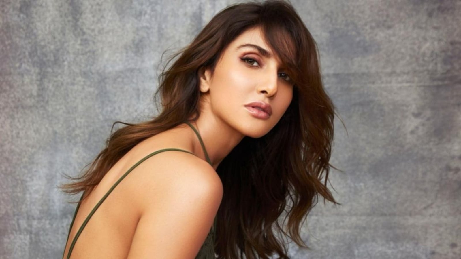 Vaani Kapoor goes bold in olive green halter-neck mini dress and we are smitten