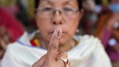 An elderly woman after casting her vote in the first phase of Manipur elections on February 28. (AP Photo) An elderly woman after casting her vote in the first phase of Manipur elections on February 28. (AP Photo)
