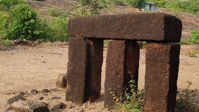 Fernandes spotted this dolmen, a prehistoric tombstone consisting of three vertical megaliths topped by a horizontal one, near a temple in Agonda in South Goa. Despite being a marker for important ancient graves, the dolmen wasn’t protected and not many locals knew its significance, he says. (Photo courtesy Pantaleão Fernandes) Fernandes spotted this dolmen, a prehistoric tombstone consisting of three vertical megaliths topped by a horizontal one, near a temple in Agonda in South Goa. Despite being a marker for important ancient graves, the dolmen wasn’t protected and not many locals knew its significance, he says. (Photo courtesy Pantaleão Fernandes)