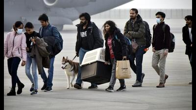 A number of students who deboarded the flights at the Hindon airbase in Ghaziabad were seen with their pets. (HT Photo) A number of students who deboarded the flights at the Hindon airbase in Ghaziabad were seen with their pets. (HT Photo)