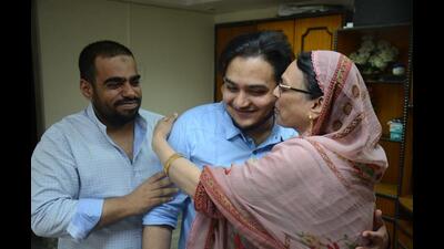 The 23-year-old student, Naushad Khan (centre), is greeted by his family members upon returning to his Mumbra home following a week’s ordeal at Ukraine border. (PRAFUL GANGURDE/HT PHOTO) The 23-year-old student, Naushad Khan (centre), is greeted by his family members upon returning to his Mumbra home following a week’s ordeal at Ukraine border. (PRAFUL GANGURDE/HT PHOTO)